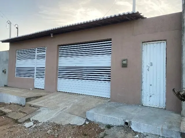 Imagem 1: Casa com Garagem pra Vender