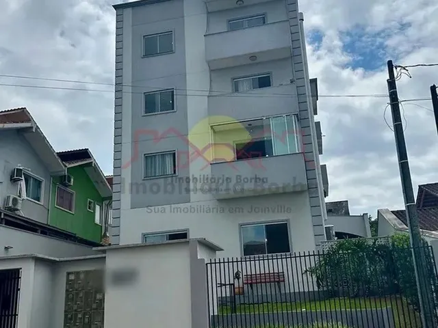 Imagem: O apartamento possui 2 Dormitórios, 1 Suíte, 3 Banheiros,