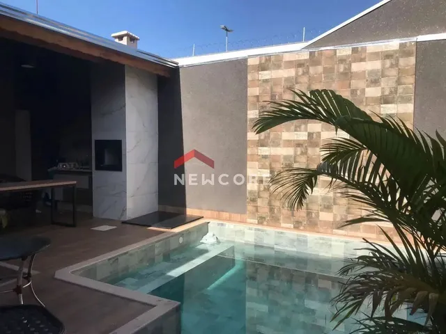 Imagem: A casa possui 3 Dormitórios, 2 Suítes, 4 Banheiros, 1