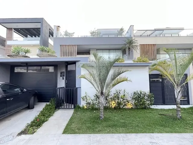 Imagem: A casa em condomínio possui 4 Dormitórios, 4 Suítes, 5