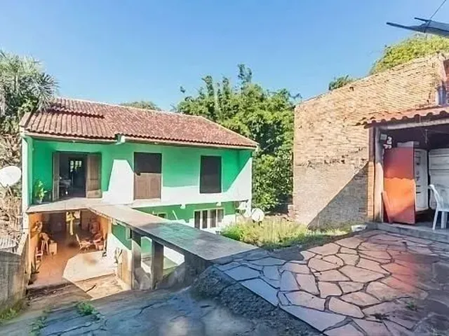 Imagem: Casa de 5 Dormitórios À Venda no Bairro