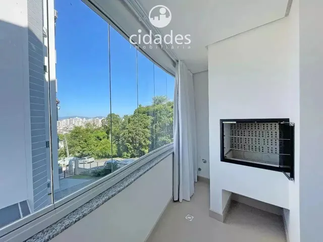 Imagem 2: Aluguel de Apartamento 2 Quartos (Suíte), Sacada com Churrasqueira e Estacionamento Bela