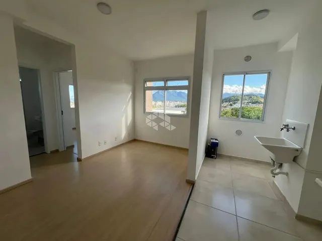 Imagem: O apartamento possui 2 Dormitórios, 1 Banheiro, 1 Vaga na