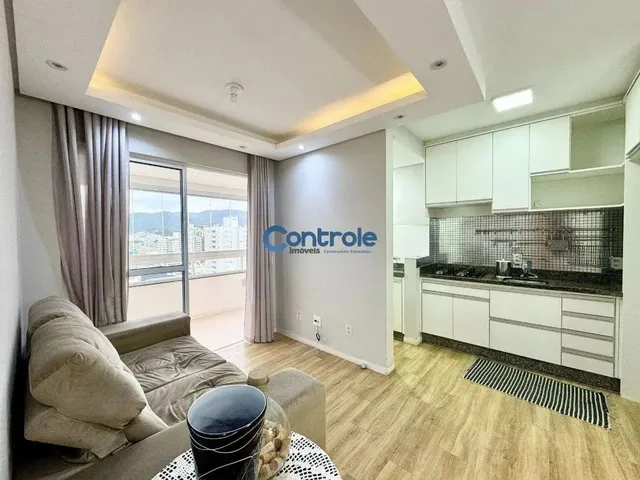 Imagem: O apartamento possui 2 Dormitórios, 1 Suíte, 2 Banheiros,