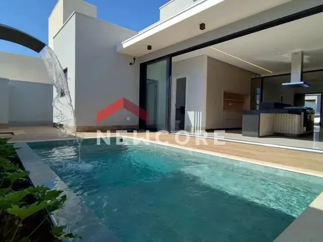 Imagem: A casa em condomínio possui 3 Dormitórios, 3 Suítes, 4