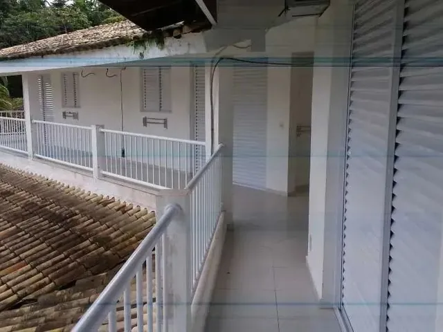 Imagem: A casa possui 5 Dormitórios, 8 Suítes, 5 Banheiros, 5