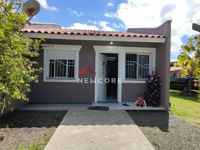 Imagem: A casa possui 3 Dormitórios, 1 Banheiro, 3 Vagas na