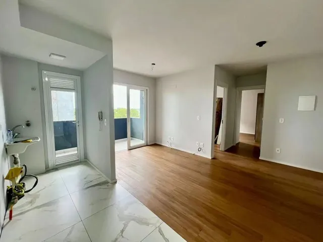 Imagem: O apartamento possui 2 Dormitórios, 1 Banheiro, 2 Vagas na