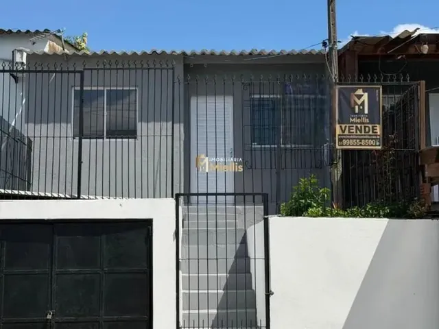 Imagem: A casa possui 2 Dormitórios, 1 Banheiro, 1 Vaga na