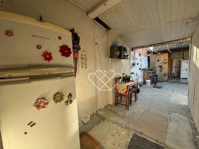 Imagem 6: Casa com Quiosque e Churrasqueira Conforto e Praticidade em Cada Detalhe