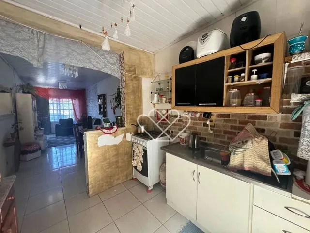 Imagem 10: Casa com Quiosque e Churrasqueira Conforto e Praticidade em Cada Detalhe