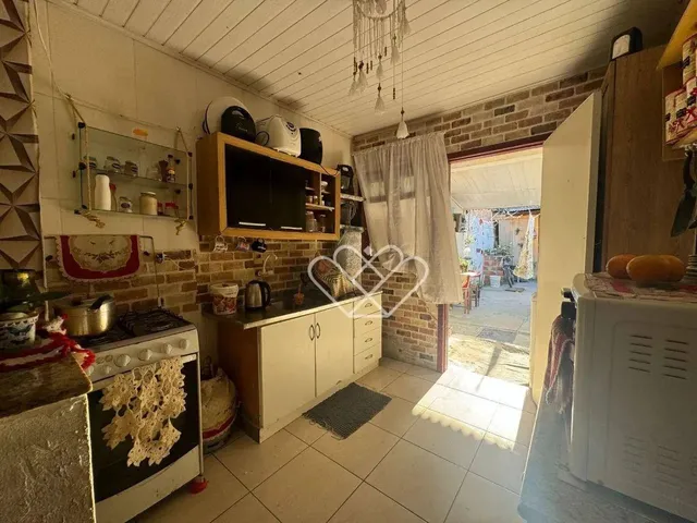 Imagem 8: Casa com Quiosque e Churrasqueira Conforto e Praticidade em Cada Detalhe