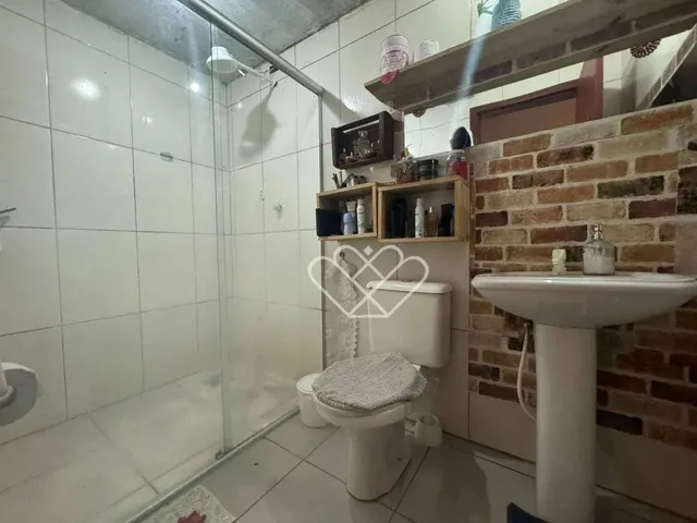 Imagem 9: Casa com Quiosque e Churrasqueira Conforto e Praticidade em Cada Detalhe