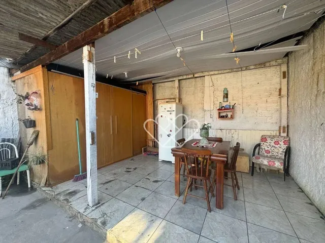 Imagem 13: Casa com Quiosque e Churrasqueira Conforto e Praticidade em Cada Detalhe