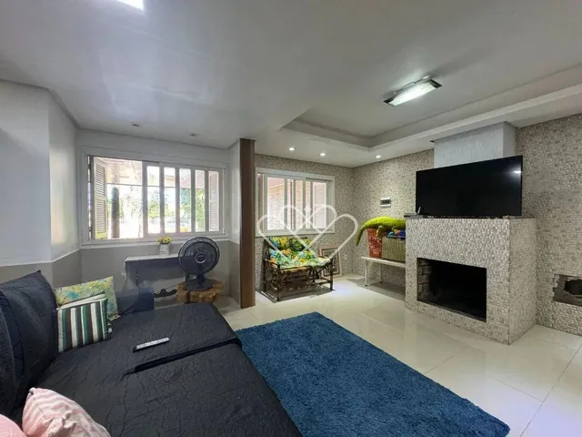 Imagem 7: Casa Espaciosa e Aconchegante: 3 Dormitórios, Área Gourmet e Localização Privilegiada!
