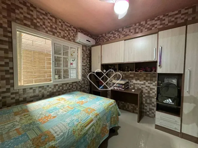 Imagem 12: Casa Espaciosa e Aconchegante: 3 Dormitórios, Área Gourmet e Localização Privilegiada!