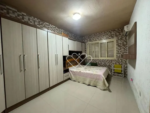 Imagem 5: Casa Espaciosa e Aconchegante: 3 Dormitórios, Área Gourmet e Localização Privilegiada!