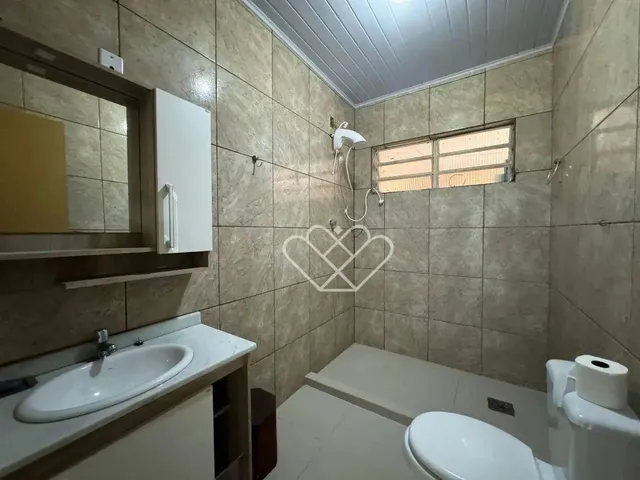 Imagem 6: Casa Espaciosa e Aconchegante: 3 Dormitórios, Área Gourmet e Localização Privilegiada!