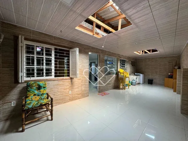 Imagem 4: Casa Espaciosa e Aconchegante: 3 Dormitórios, Área Gourmet e Localização Privilegiada!