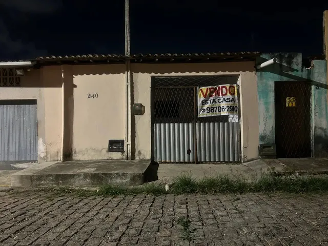 Imagem 2: Casa com Três Quartos e Garagem