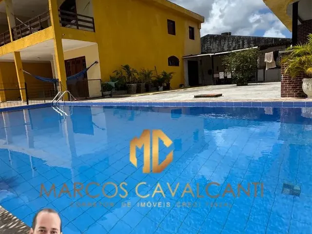 Imagem: A casa possui 5 Dormitórios, 4 Banheiros, 5 Vagas na