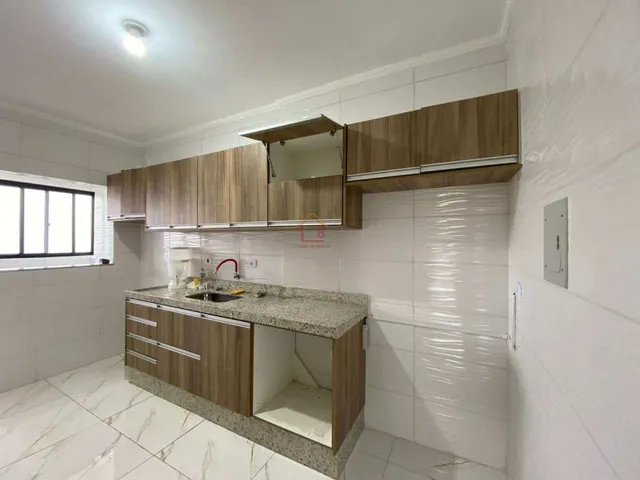 Imagem: O apartamento possui 2 Dormitórios, 1 Suíte, 2 Banheiros,