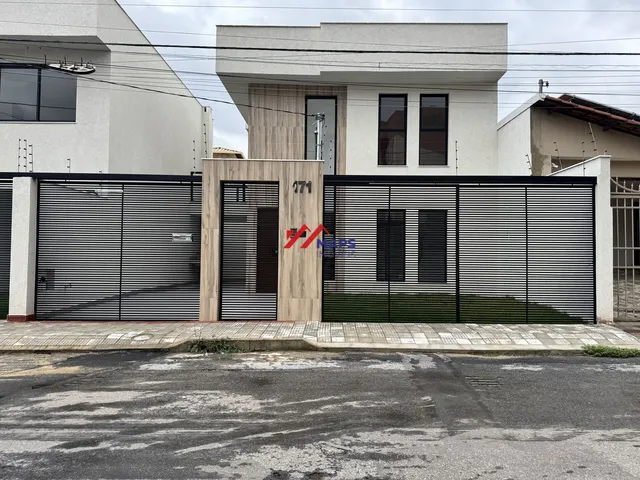Imagem: Casa à venda com três quartos, suíte