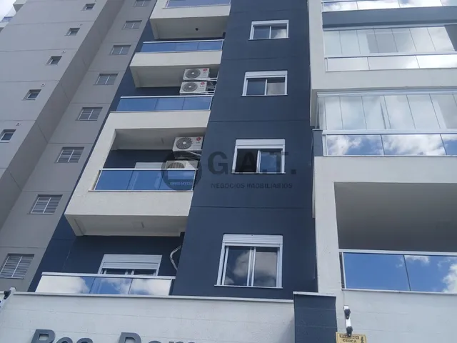 Imagem: O apartamento possui 2 Dormitórios, 1 Suíte, 2 Banheiros,