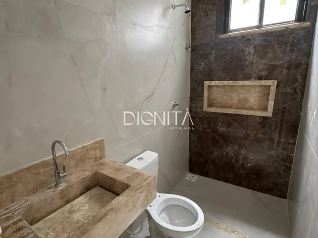 Imagem 13: Sofisticação e Conforto: Linda Casa com 3 Suítes e Acabamento Premium