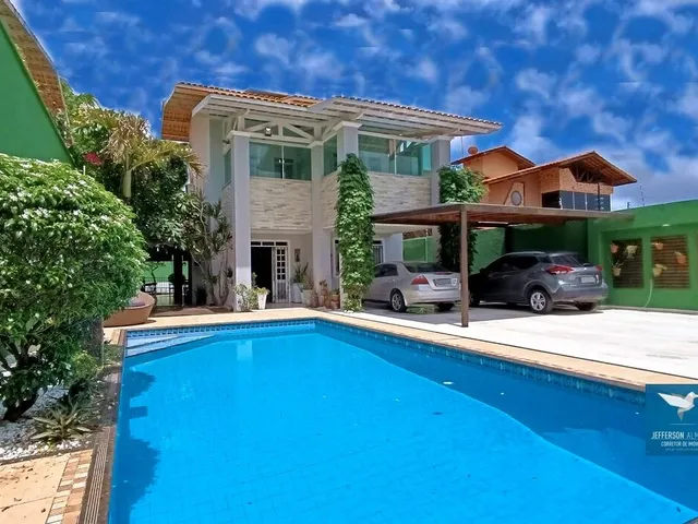 Imagem 10: Casa Duplex com Móveis Projetados, Piscina, Deck e Energia Solar em Rua Pública no