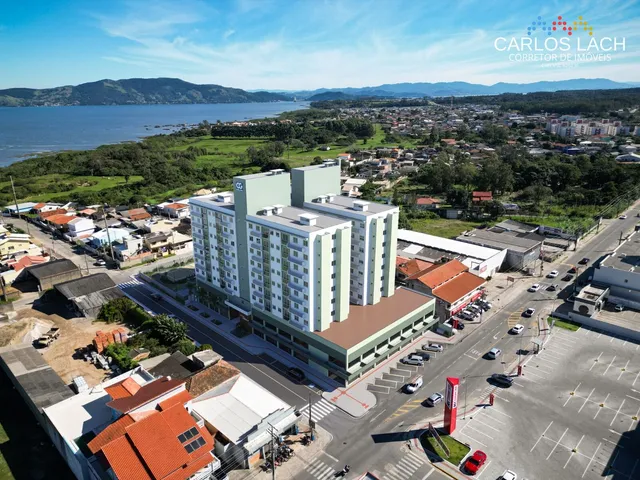 Imagem: O apartamento possui 2 Dormitórios, 1 Suíte, 2 Banheiros,