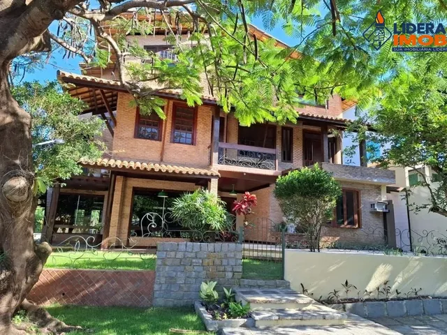 Imagem: A casa possui 5 Dormitórios, 5 Suítes, 6 Banheiros, 2