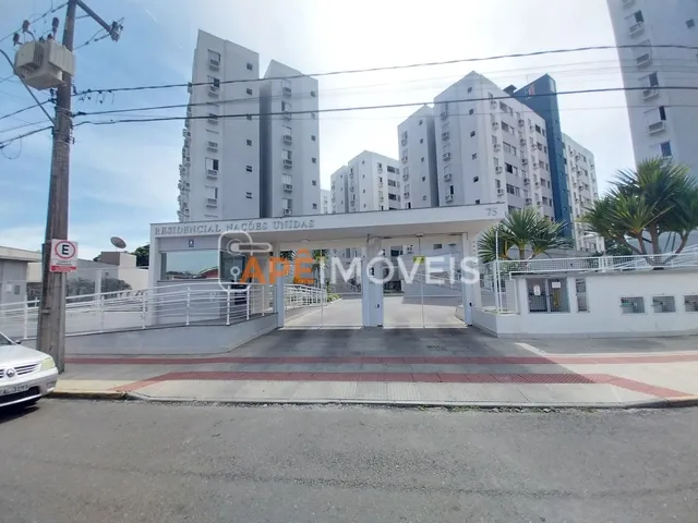 Imagem: O apartamento possui 2 Dormitórios, 1 Suíte, 1 Banheiro,
