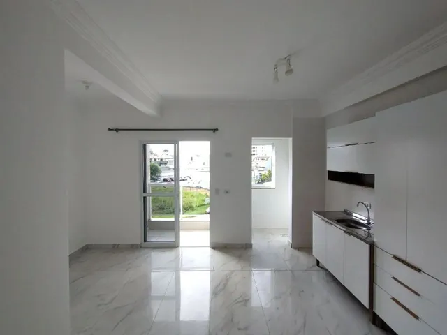 Imagem 2: Apartamento com Suíte, Sacada com Churrasqueira e Garagem Coberta para Alugar Próximo