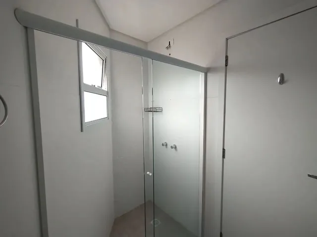 Imagem 6: Apartamento com Suíte, Sacada com Churrasqueira e Garagem Coberta para Alugar Próximo