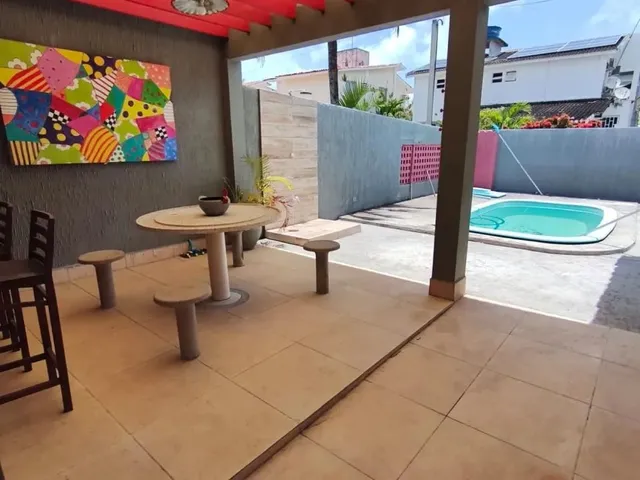 Imagem: A casa em condomínio possui 4 Dormitórios, 3 Suítes, 4