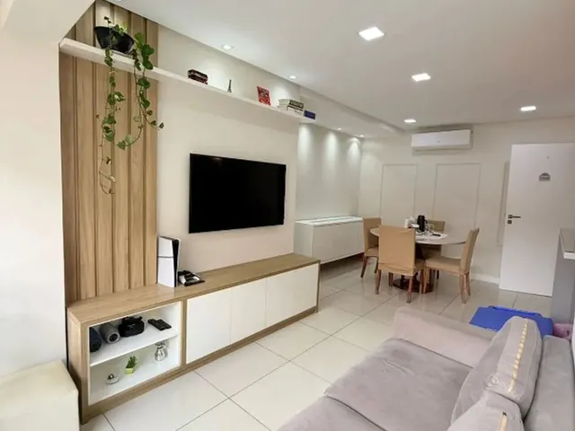 Imagem: O apartamento possui 2 Dormitórios, 1 Suíte, 2 Banheiros,