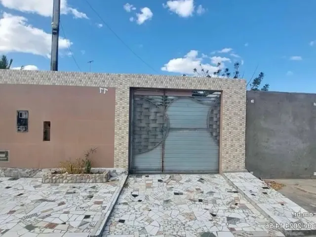 Imagem: A casa possui 2 Dormitórios, 1 Banheiro, 1 Vaga na garagem