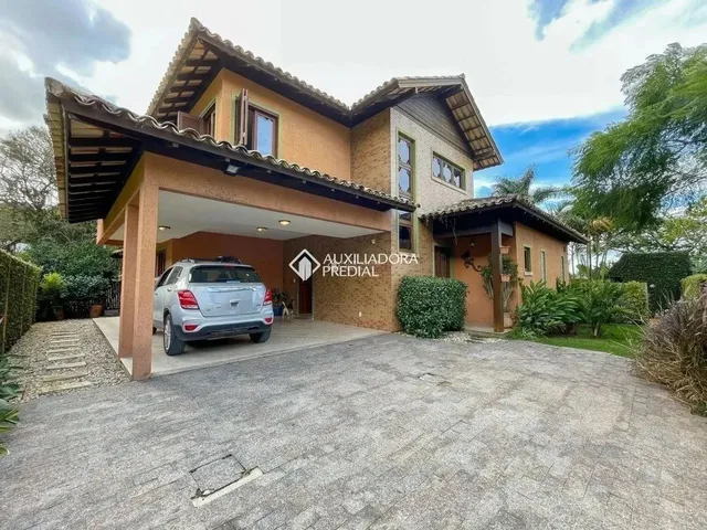 Imagem 15: Auxiliadora Predial Lagoa da Conceição Aluga Casa com 3 Dormitorios, Sendo Uma Suite