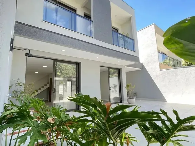 Imagem: Casa Moderna com Paisagismo Integrado Bairro