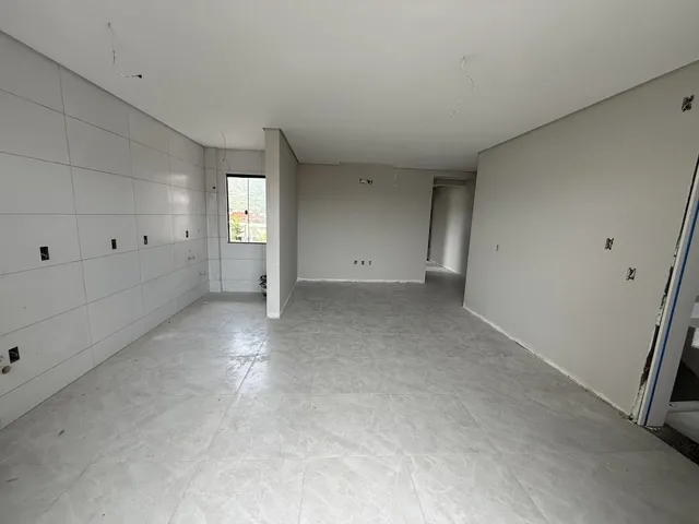 Imagem 12: Apartamento de dois dormitórios, sendo uma suíte, sacada com churrasqueira e uma vaga