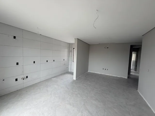 Imagem 7: Apartamento de dois dormitórios, sendo uma suíte, sacada com churrasqueira e uma vaga