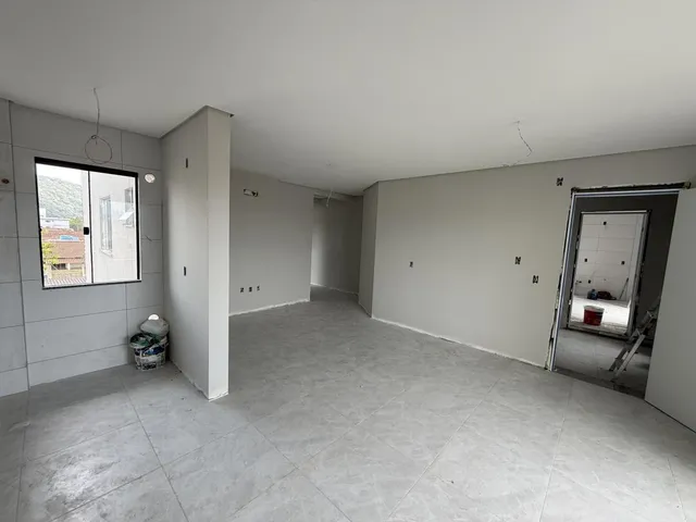 Imagem 11: Apartamento de dois dormitórios, sendo uma suíte, sacada com churrasqueira e uma vaga