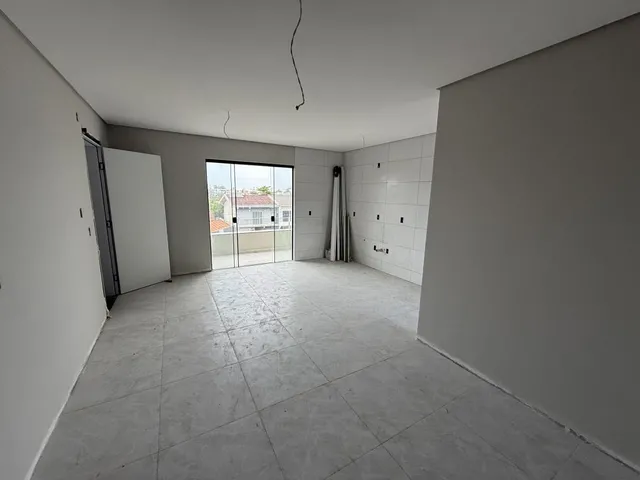Imagem 4: Apartamento de dois dormitórios, sendo uma suíte, sacada com churrasqueira e uma vaga