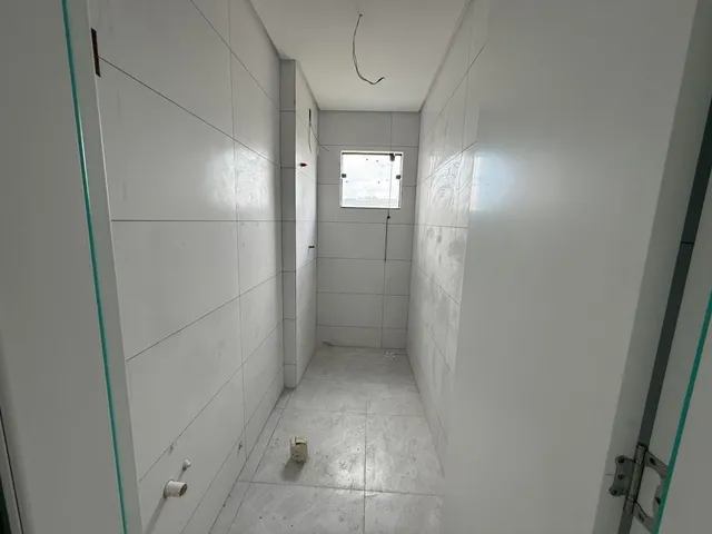 Imagem 16: Apartamento de dois dormitórios, sendo uma suíte, sacada com churrasqueira e uma vaga