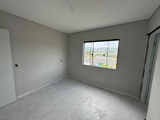 Imagem 13: Apartamento de dois dormitórios, sendo uma suíte, sacada com churrasqueira e uma vaga