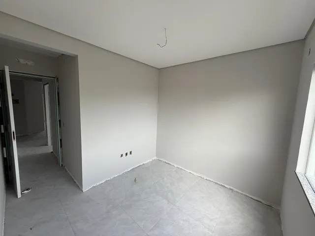 Imagem 8: Apartamento de dois dormitórios, sendo uma suíte, sacada com churrasqueira e uma vaga