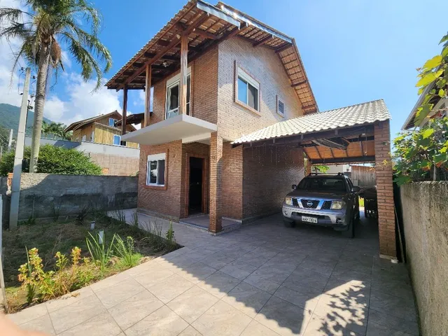 Imagem: A casa possui 2 Dormitórios, 2 Banheiros, 2 Vagas na