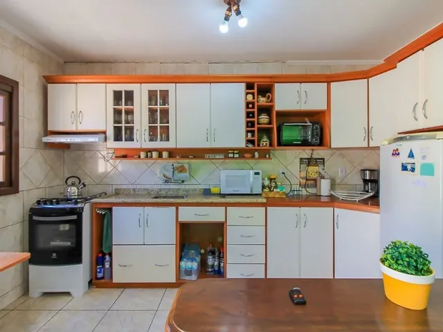 Imagem 9: Maravilhosa casa à venda em Porto Alegre-RS, bairro Cavalhada, 3 quartos, 1 suíte, 6