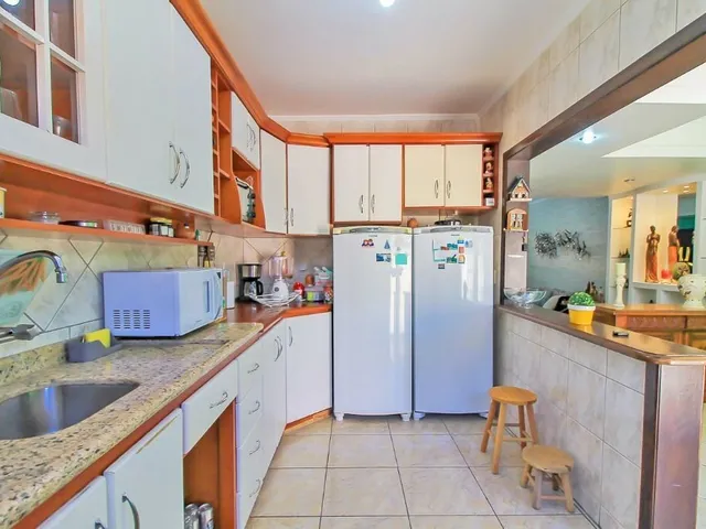 Imagem 10: Maravilhosa casa à venda em Porto Alegre-RS, bairro Cavalhada, 3 quartos, 1 suíte, 6